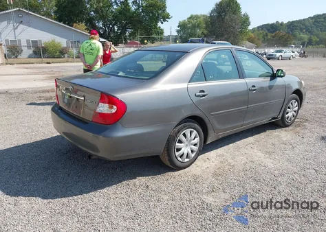 2002 Toyota Camry Le from USA, damaged, VIN 4T1BE32K72U520505